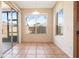 Cozy breakfast nook with large windows offering natural light and tile flooring at 3633 Sickle St, Orlando, FL 32812