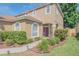 Beautiful front exterior showcasing manicured landscaping, walkway, and a charming front entrance at 3633 Sickle St, Orlando, FL 32812