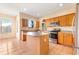Bright and airy kitchen featuring modern appliances, center island, and tile flooring at 3633 Sickle St, Orlando, FL 32812