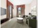 Staged living room with modern decor, stylish furniture, and bright windows at 3633 Sickle St, Orlando, FL 32812