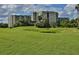 Aerial view of condo building and surrounding golf course at 4 Oceans West Blvd # 502D, Daytona Beach Shores, FL 32118
