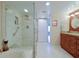 Updated bathroom with a large shower, granite vanity, and modern fixtures at 4 Oceans West Blvd # 502D, Daytona Beach Shores, FL 32118