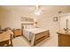 Charming bedroom with a queen-size bed and built-in shelving at 4 Oceans West Blvd # 502D, Daytona Beach Shores, FL 32118