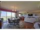 Bright dining area with hardwood floors and a view at 4 Oceans West Blvd # 502D, Daytona Beach Shores, FL 32118