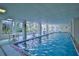 Indoor heated pool with adjacent seating area at 4 Oceans West Blvd # 502D, Daytona Beach Shores, FL 32118