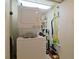 Convenient laundry room with a stackable washer and dryer at 4 Oceans West Blvd # 502D, Daytona Beach Shores, FL 32118