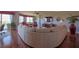 Living room boasts hardwood floors, large sectional sofa, and a flat-screen TV at 4 Oceans West Blvd # 502D, Daytona Beach Shores, FL 32118