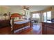 Spacious main bedroom with wood floors and a king-size bed at 4 Oceans West Blvd # 502D, Daytona Beach Shores, FL 32118