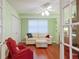 Bright office with built-in shelving and hardwood floors at 4 Oceans West Blvd # 502D, Daytona Beach Shores, FL 32118
