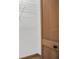 Walk in closet featuring ample storage with wire shelving and hardwood floors at 510 Sandy Bluff Trl, Deland, FL 32724