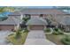 Townhome with an attached two-car garage and well-manicured landscaping, close to the water at 510 Sandy Bluff Trl, Deland, FL 32724
