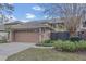 Charming single-story home with a two-car garage and well-maintained landscaping at 510 Sandy Bluff Trl, Deland, FL 32724
