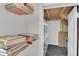 Well-organized pantry with ample shelving for storage, maximizing kitchen space at 510 Sandy Bluff Trl, Deland, FL 32724