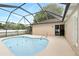 Screened-in porch with an in-ground pool and a view of the blue sky above at 583 Wilburton Dr, Deltona, FL 32738