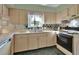 Charming kitchen area with sleek countertops, modern appliances, and ample natural light at 600 N Boundary Ave # 114B, Deland, FL 32720