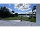 Beautiful backyard view of a lake and fountain from the covered patio at 6301 Swanson St, Windermere, FL 34786