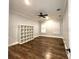 Spacious bedroom with hardwood floors, lots of natural light and a built in bookshelf at 6301 Swanson St, Windermere, FL 34786