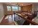 Stairway leading up to the bonus room with a wallpapered accent wall at 6301 Swanson St, Windermere, FL 34786