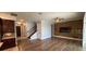 Open-concept living room with hardwood floors and plenty of natural light at 6301 Swanson St, Windermere, FL 34786
