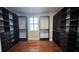 Large walk-in closet with built-in shelving and drawers for optimal organization at 6301 Swanson St, Windermere, FL 34786