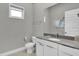 Well-lit bathroom with a sleek vanity and modern fixtures, providing a comfortable and stylish space at 7740 Sandy Ridge Dr # 206, Kissimmee, FL 34747
