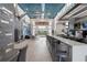 Expansive clubhouse offers a long bar, television, and modern design, creating a welcoming and social atmosphere at 7740 Sandy Ridge Dr # 206, Kissimmee, FL 34747