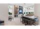 Stylish common area with a bar, seating, and media center, providing an ideal space for relaxation and socializing at 7740 Sandy Ridge Dr # 206, Kissimmee, FL 34747