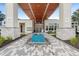 The grand entrance features a decorative fountain, covered walkway, and modern architecture, creating a welcoming first impression at 7740 Sandy Ridge Dr # 206, Kissimmee, FL 34747