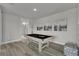 This game room features a pool table, modern artwork, and an ensuite bathroom with tile surround at 7740 Sandy Ridge Dr # 206, Kissimmee, FL 34747