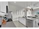 Modern kitchen featuring white cabinets and stainless steel appliances at 7740 Sandy Ridge Dr # 206, Kissimmee, FL 34747