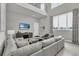 Bright living area with tall ceilings, neutral colors, and large windows at 7740 Sandy Ridge Dr # 206, Kissimmee, FL 34747