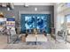 Inviting lobby area with comfortable seating, contemporary artwork, and serene decor for relaxation at 7740 Sandy Ridge Dr # 206, Kissimmee, FL 34747