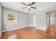 Inviting bedroom with hardwood floors, a window, closet, and natural light at 829 Madison Ave, Daytona Beach, FL 32114