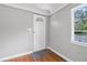 Bright entryway with hardwood floors, natural light, and a neutral color scheme at 829 Madison Ave, Daytona Beach, FL 32114