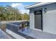 Charming front entrance featuring a modern front door, and landscaped details at 829 Madison Ave, Daytona Beach, FL 32114