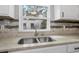 Modern kitchen sink with stylish granite countertops, and a sleek design at 829 Madison Ave, Daytona Beach, FL 32114