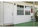 Charming entrance featuring a well-lit porch with decorative accents and white paneled door at 840 Center Ave # 9, Daytona Beach, FL 32117