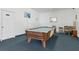 Game room featuring a classic pool table and seating creating an ideal spot for relaxation and entertainment at 840 Center Ave # 9, Daytona Beach, FL 32117