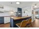 Stylish kitchen featuring two-tone cabinets, butcher block counters and stainless steel appliances at 840 Center Ave # 9, Daytona Beach, FL 32117