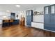Open floor plan living room featuring built-in cabinetry, hardwood floors, and recessed lighting at 840 Center Ave # 9, Daytona Beach, FL 32117