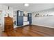 Spacious living room with hardwood floors, custom cabinetry, and modern lighting fixtures at 840 Center Ave # 9, Daytona Beach, FL 32117