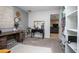 Bedroom featuring a bed, desk, and doorway to the living room at 893 S Dean Cir, Deltona, FL 32738