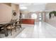 Spacious dining area that flows seamlessly into the kitchen and living areas, perfect for modern living at 893 S Dean Cir, Deltona, FL 32738