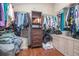 Walk-in closet offers ample storage space with built-in shelving and custom organization at 893 S Dean Cir, Deltona, FL 32738