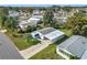 Aerial view of the home in a residential neighborhood at 907 Rose Ln, The Villages, FL 32159