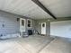 Spacious carport offering covered parking and protection from the elements at 907 Rose Ln, The Villages, FL 32159