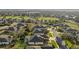 An aerial view of a community and golf course, highlighting the home's prime location at 9580 Sw 71St Loop, Ocala, FL 34481