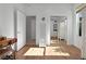 Spare bedroom featuring an armoire and closet with sliding mirror doors provides flexible space for guests or hobbies at 9580 Sw 71St Loop, Ocala, FL 34481