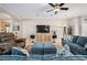 Bright, airy living room with neutral tones, recessed lights, and ceiling fan at 9580 Sw 71St Loop, Ocala, FL 34481