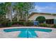 Inviting spa with manicured landscaping and clearly posted rules for a relaxing experience at 9580 Sw 71St Loop, Ocala, FL 34481
